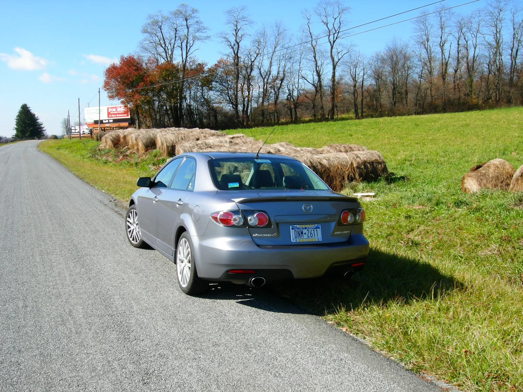 Mazdaspeed6 rear three-quarter on a country road