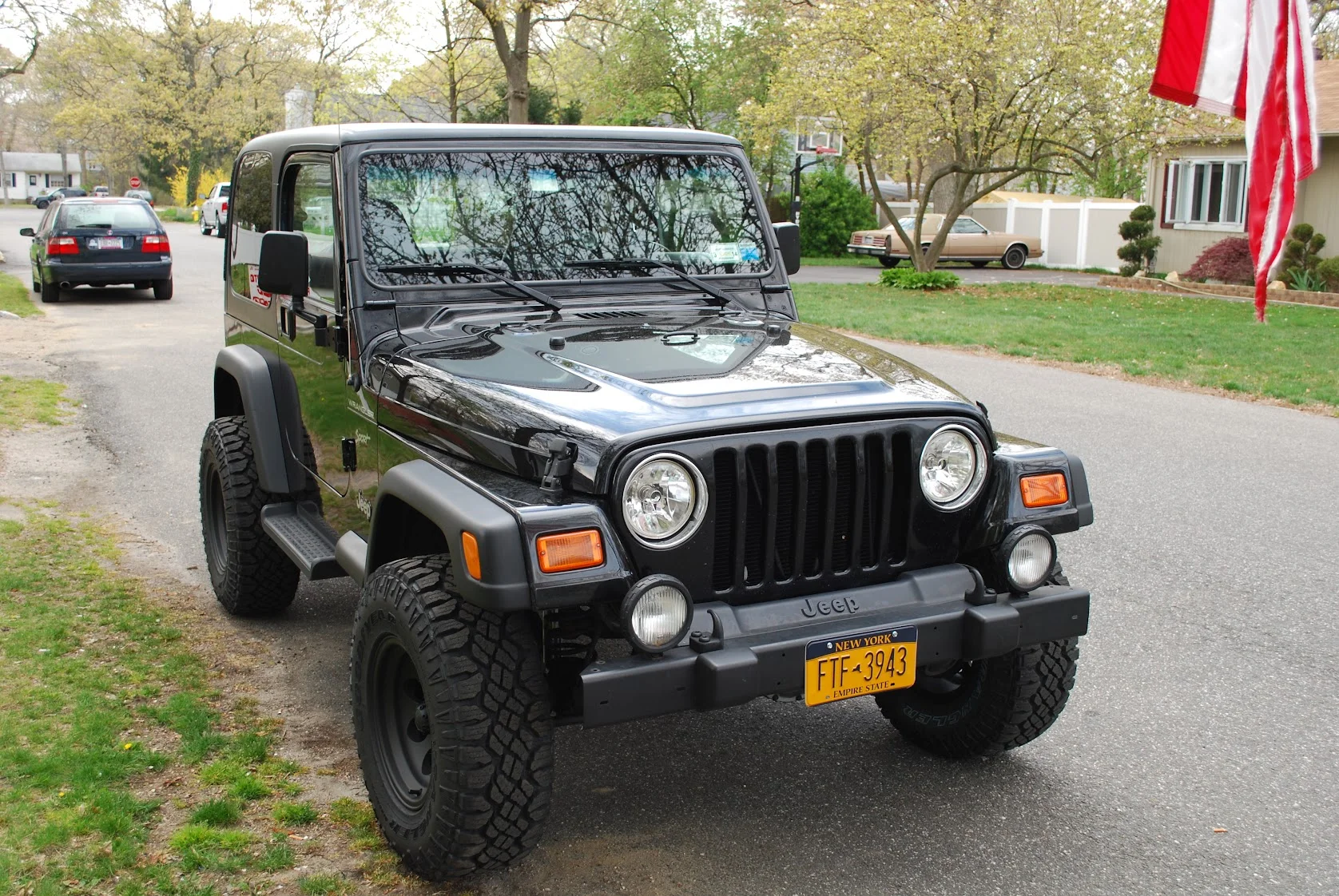 Jeep Wrangler TJ in black, front three-quarter view