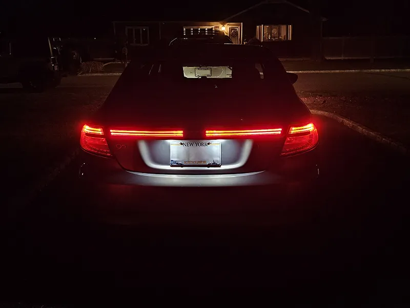 2011 Saab 9-5 rear light bar at night