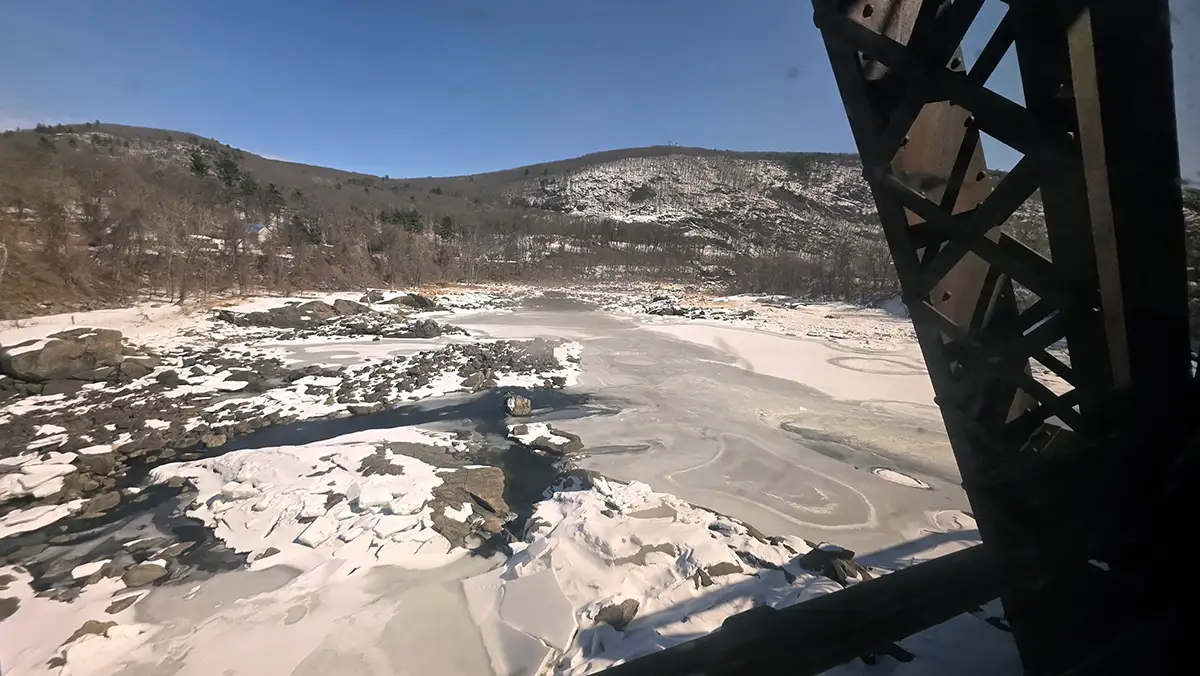 Frozen river seen from Amtrak train bridge on the ride back to New York