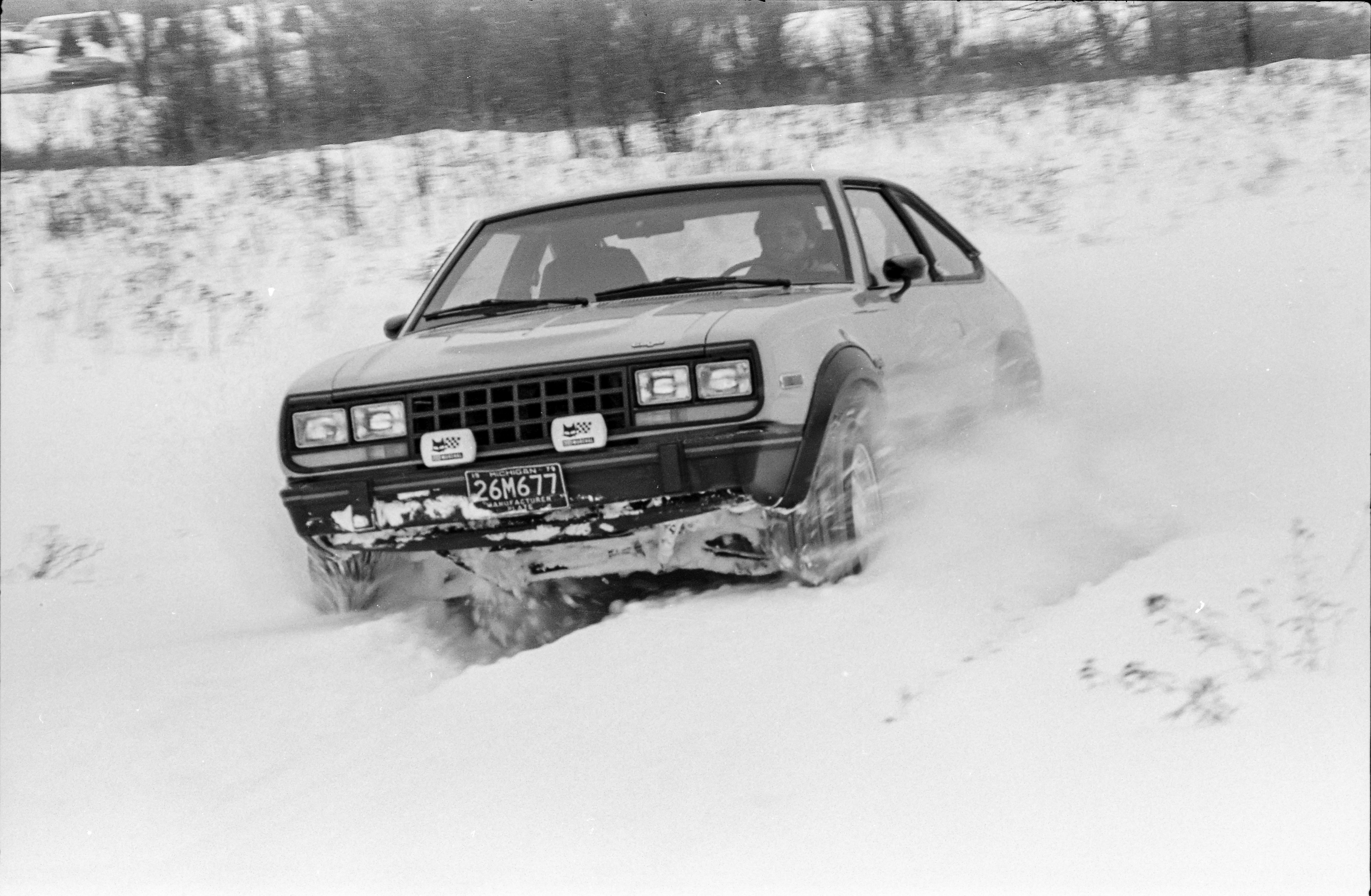 1981 AMC Eagle plowing through snow