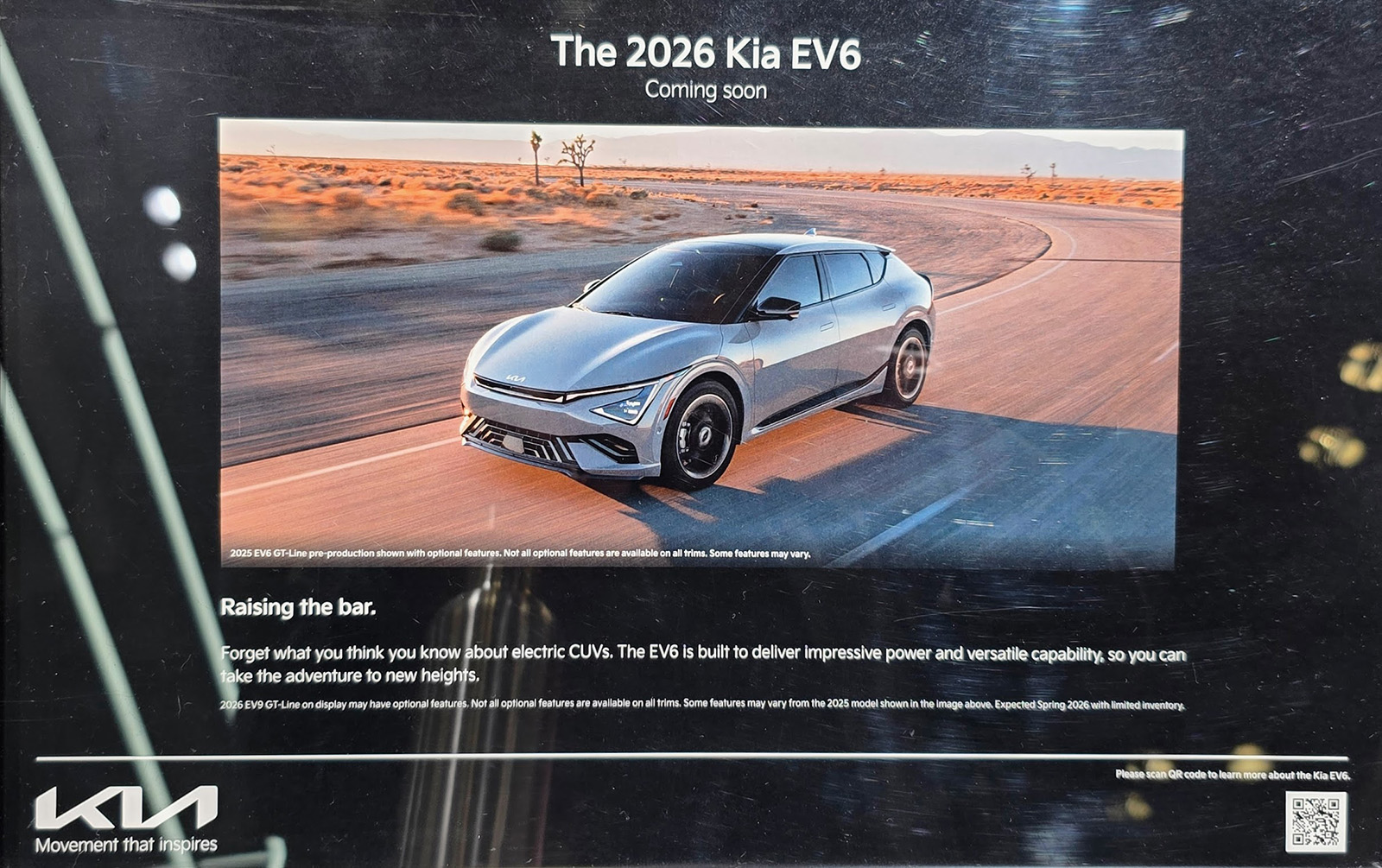 2026 Kia EV6 promotional plaque at the NY Auto Show